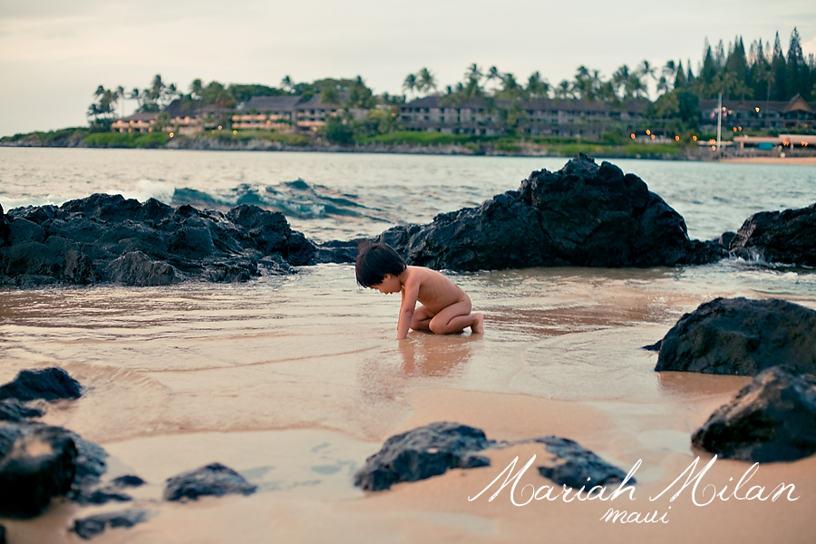 Boy discovering a Napili tide pool
