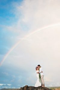 Dramatic wedding rainbows at Ironwood Beach in Kapalua