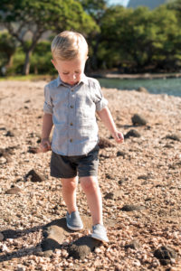 Toddler on the Maui coral rocks