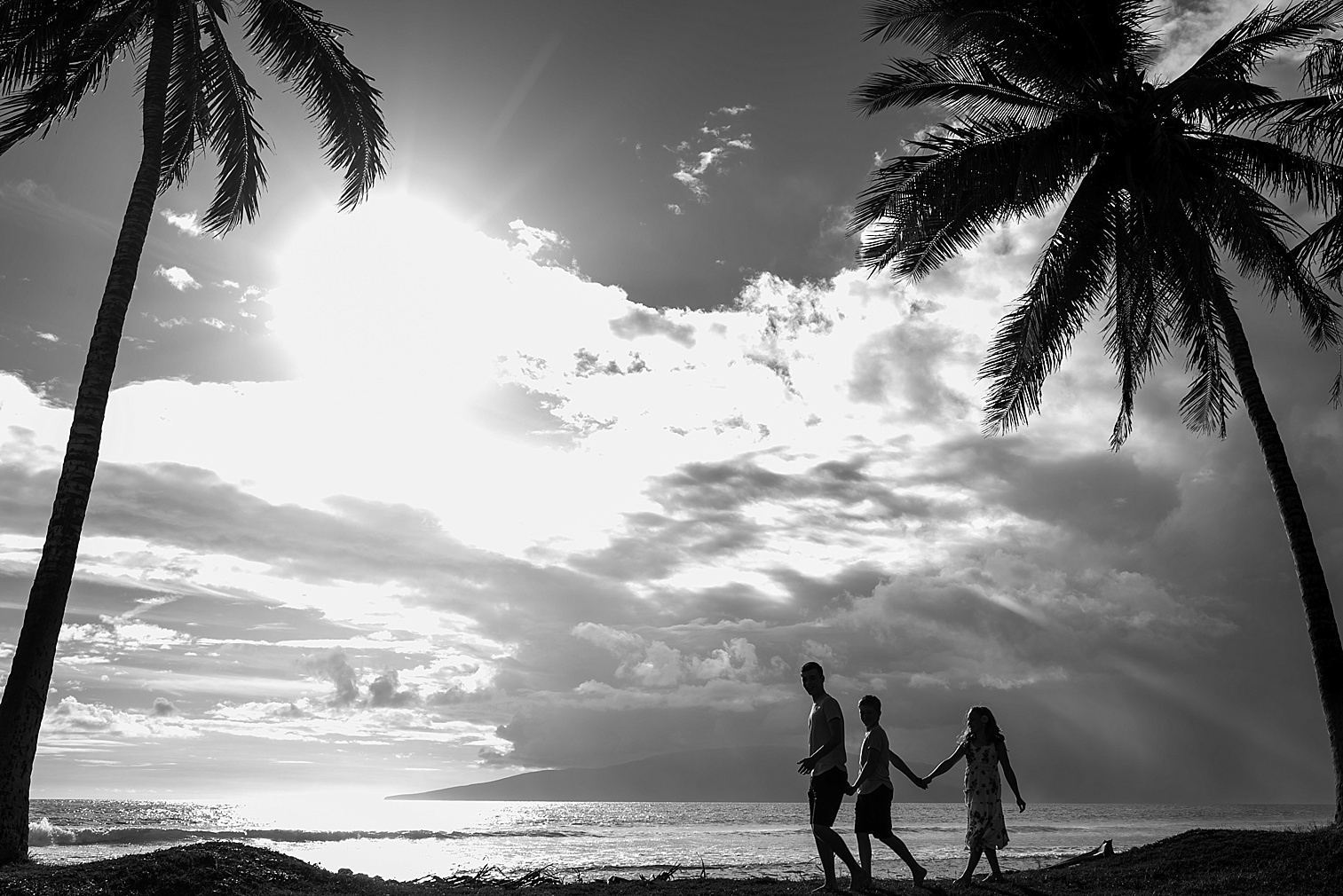 kids walking through palm trees on Maui