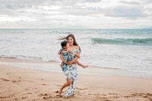 Sunset family session at Maluaka Beach in Makena, Maui on a high tide, stormy evening by Maui photographer Mariah Milan