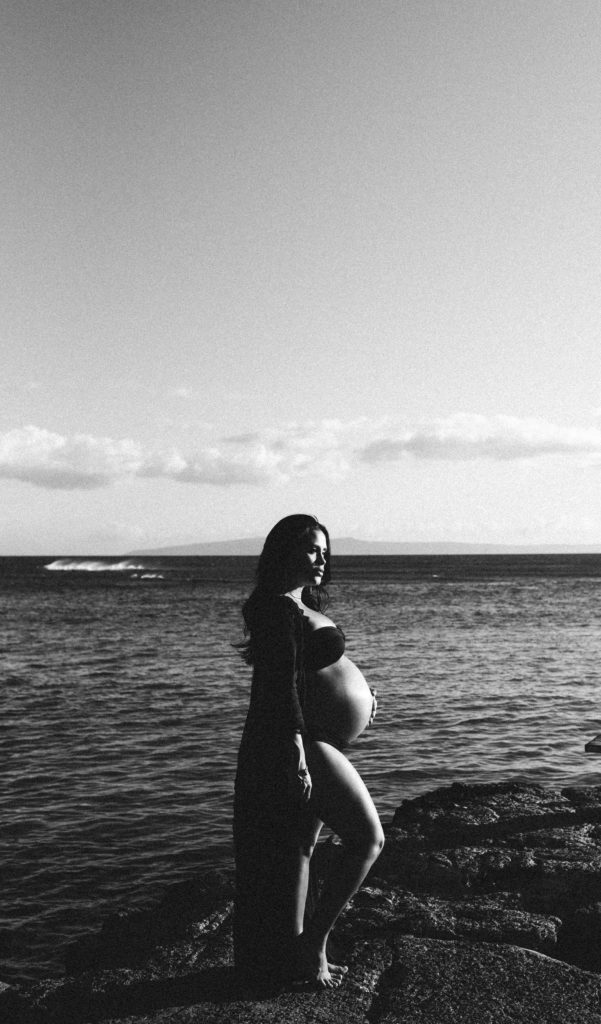 dramatic bw image of a pregnant mom