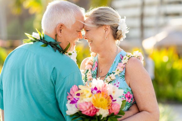 anniversary vow renewal at the sheraton maui in kaanapali featuring tropical flowers