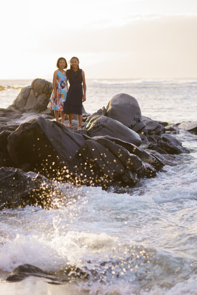 Special moments captured at kapalua bay by Mariah Milan photographers with a golden sky and crashing waves