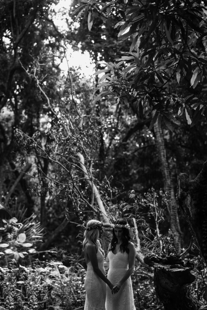Black and white moment of Dori & Natalie in Honolua Forest, a dreamy Maui elopement portrait.