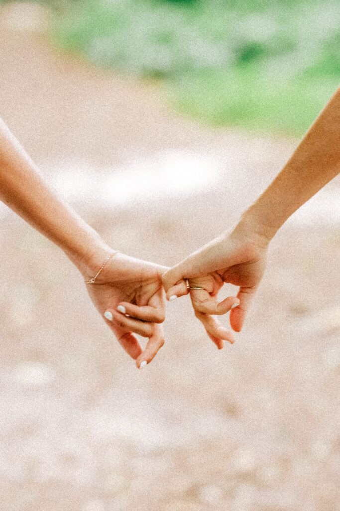Hands gently interlocked, symbolizing the deep connection of this intimate Maui elopement.