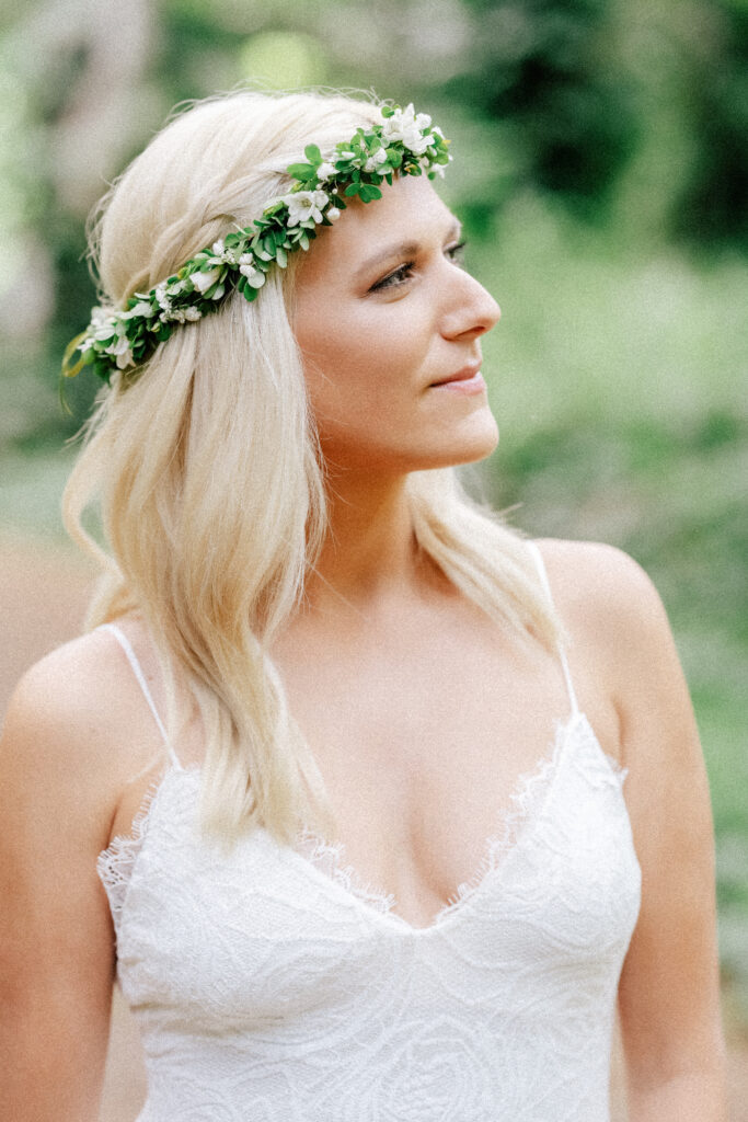 A bridal portrait highlighting soft golden light, floral crowns, and the beauty of Maui elopements.