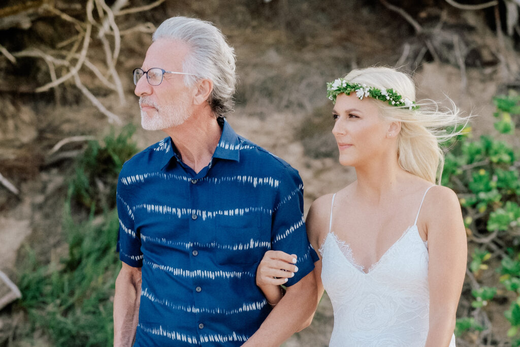 A touching moment as a father walks his daughter down the aisle at this Maui micro wedding.